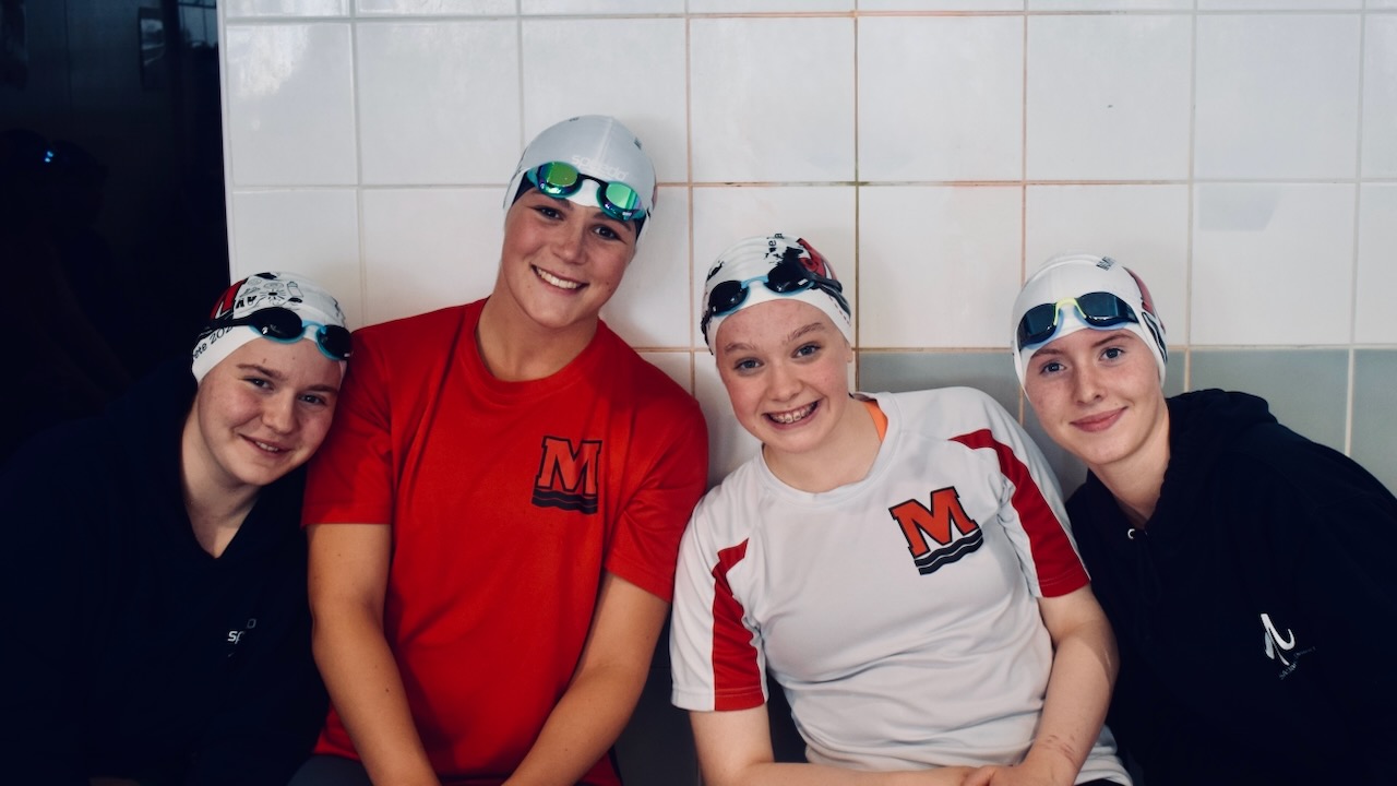 Four Monifieth swimmers together in club kit